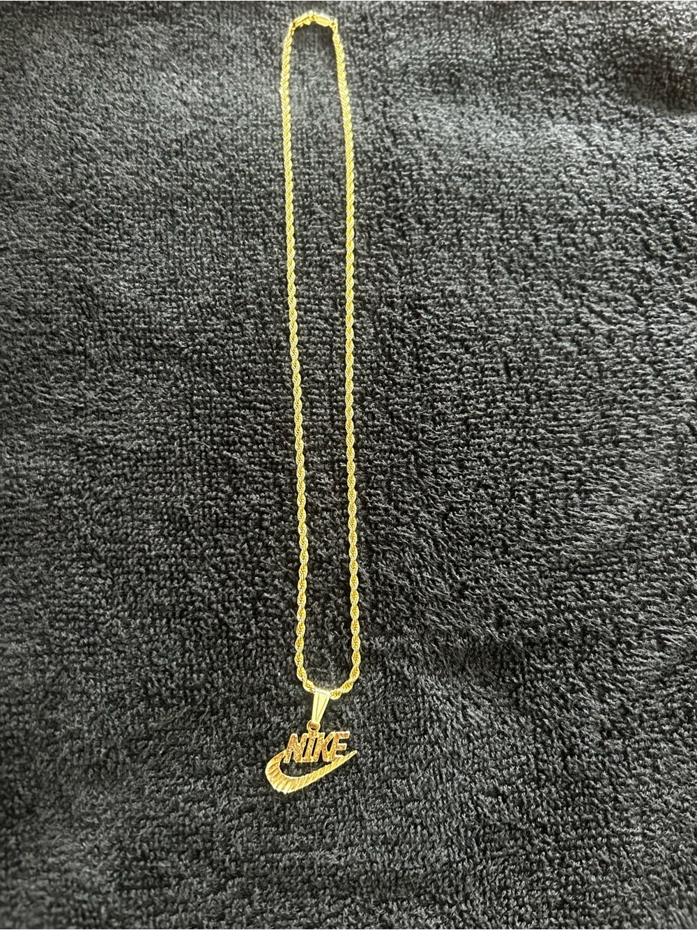 Nike Gold-tone Swoosh Pendant Necklace
